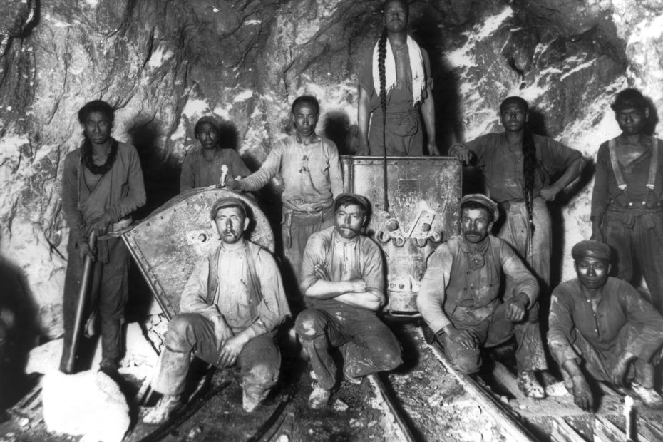 Black Chinese and White laborers in a gold mine in South Africa