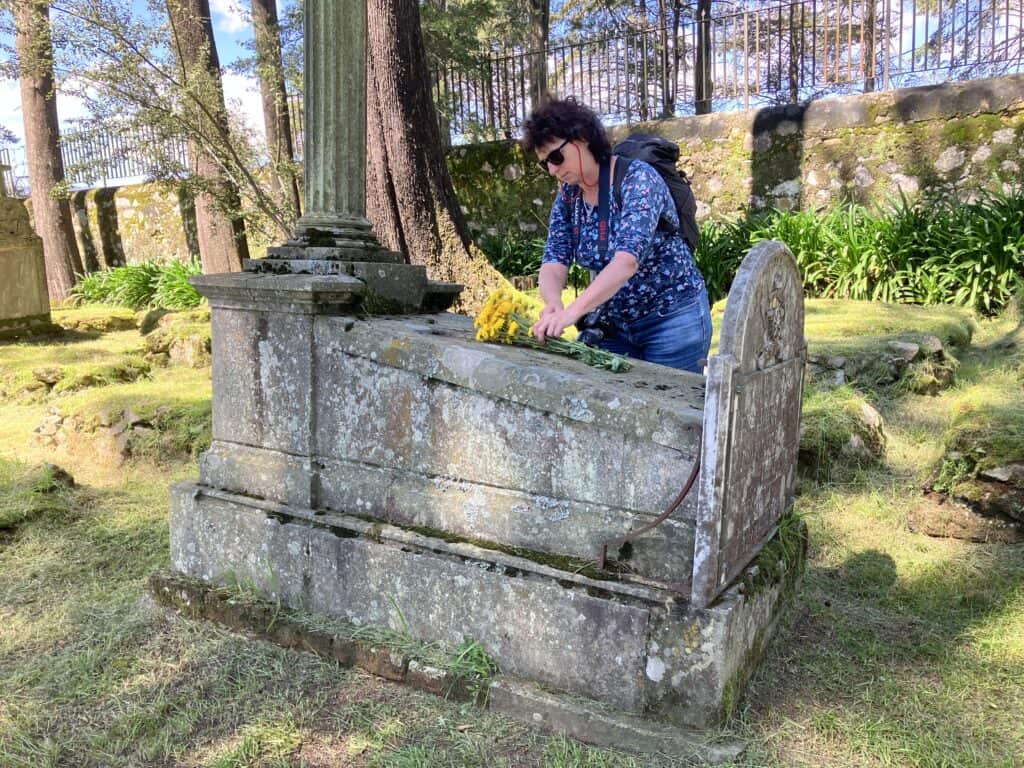 Laying flowers on my Trythall family grave at the English Cemetery